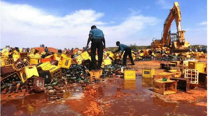 Reactions As Hisbah Destroys 2.5 Million Bottles Of Alcohol In Kano