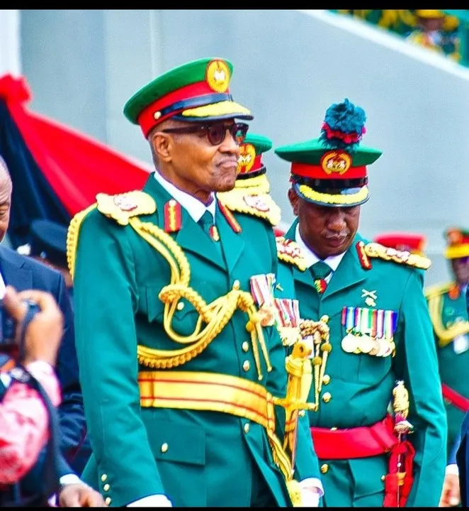 Photos Of President Buhari In Full Military Uniform At Army Parade In Abuja